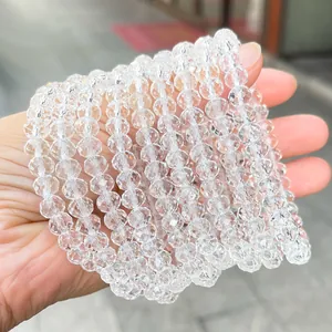Diversi fili di braccialetti in perle di abaco in cristallo bianco sfaccettato