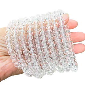 Braccialetti in cristallo bianco naturale sfaccettato con perle trasparenti a rullino.
