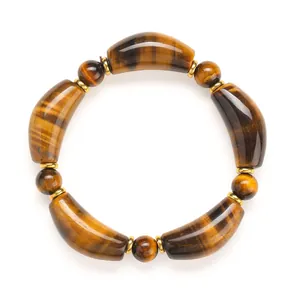 Natural Tiger Eye stone bracelet featuring curved horn beads and gold-tone spacers.