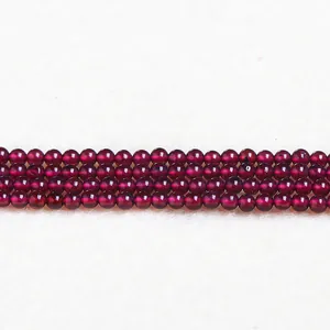 Macrofoto van 2mm 3mm donkerrode granaat agaat ronde kralen voor sieraden