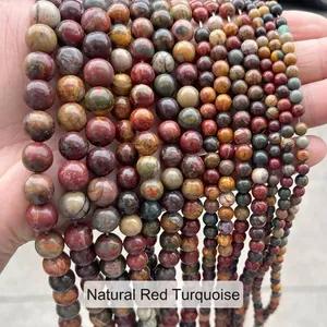 Gros plan sur des perles rondes en jaspe naturel pour la création de bijoux DIY