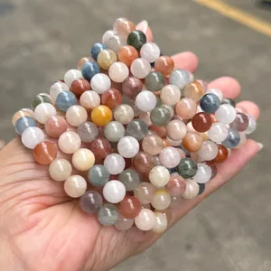 Detailed view of natural colorful rabbit hair quartz bracelets with multi-gemstone beads
