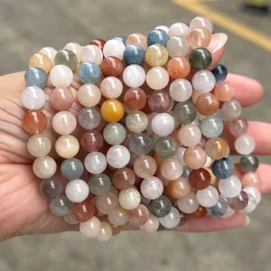 Close-up of natural colorful rabbit hair rutilated quartz bead bracelets for women.