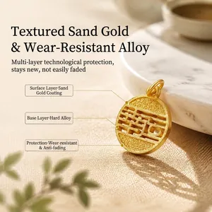 Detail view showing multi-layer gold-plated alloy structure of the lucky charm pendant.