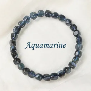Natuurlijke zwarte aquamarijn kralenarmband met glanzende blauwe glans en kralen