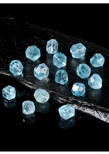Macro detail of natural light blue topaz faceted irregular beads for handmade jewelry making