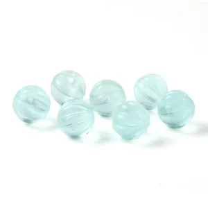 Set of seven natural transparent green fluorite pumpkin beads for DIY jewelry crafts