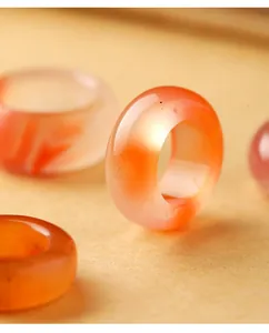 Detailed macro shot of translucent ice-drifting South Red Agate ring accessory