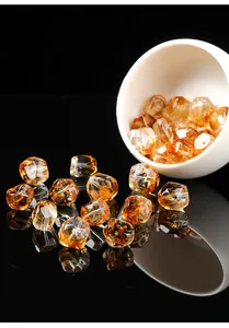 Detailed view of high-clarity irregular faceted citrine crystal beads for jewelry