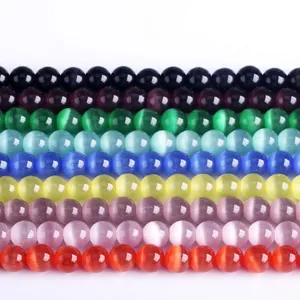 Plusieurs rangées de perles rondes en pierre œil de chat pour la création de bijoux