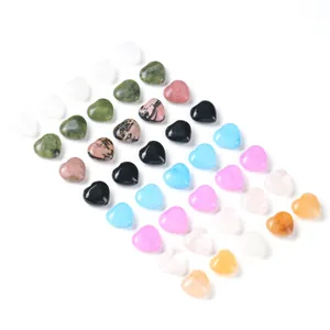 Selection of assorted natural heart shaped stones for DIY jewelry making and healing