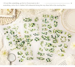 Detailed macro view of vintage floral stickers collection for scrapbooking and DIY crafts