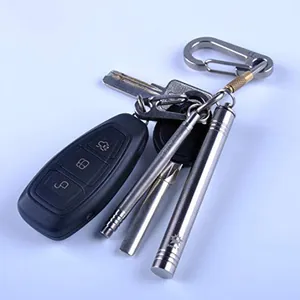 Premium titanium EDC waterproof storage capsule with portable toothpick on a keychain