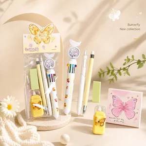 Aesthetic butterfly stationery gift set including multicolor pens and correction tape.