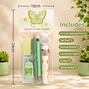 Detail view of butterfly stationery set including pens, eraser and correction tape
