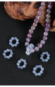 Detailed view of natural ice blue aquamarine crystal spacers for DIY jewelry making