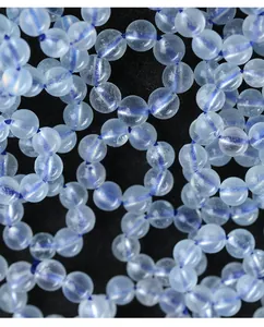 Macro detail showing the ice translucent texture of natural aquamarine bead rings for jewelry