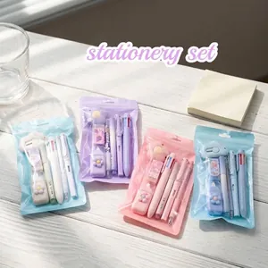 Close-up of four pastel macaron color stationery sets featuring pens and erasers on a desk