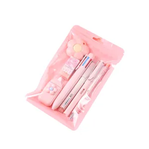 Comprehensive pink 7-piece student stationery set including pens and erasers in a gift bag