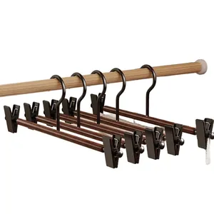 Set van 5 luxe houten broekhangers met verstelbare antislip metalen clips voor de kledingkast.