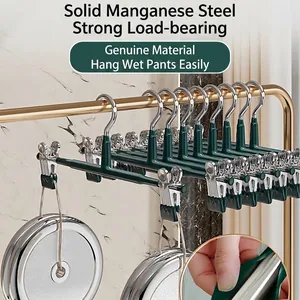 Heavy-duty trace-less metal pants hangers with clips for organized closet storage