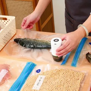 Portable electric handheld vacuum sealer machine with reusable textured food storage bags