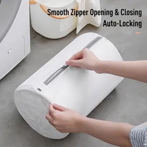 Sac à linge cylindrique en maille blanche avec une fermeture éclair grise fluide