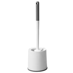 Brosse de toilettes minimaliste avec support blanc et gris pour un nettoyage de salle de bain