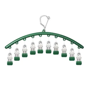 Durable green laundry hanger with ten stainless steel clips for drying socks and towels