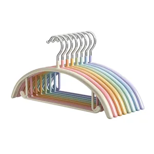 Set of 10 non-slip arched seamless clothes hangers in pastel colors for coats and jackets