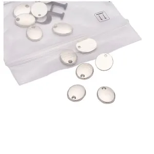 Set of silver oval metal tags with holes for DIY jewelry making and custom engraving charms