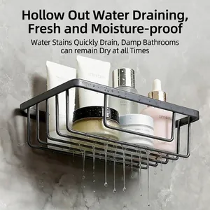Modern wall-mounted black metal bathroom shelf with hollow design for quick drainage