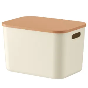 Minimalist rectangular desktop storage box with orange lid and side handles