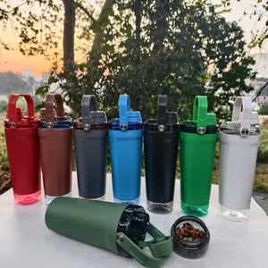 Detail of multi-colored protein shaker bottles with integrated bottom storage compartments
