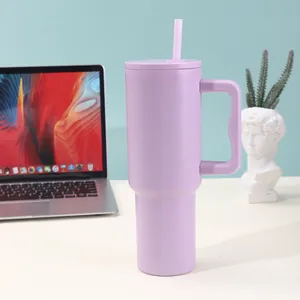 Macro view of purple 40oz vacuum insulated tumbler with ergonomic handle and straw