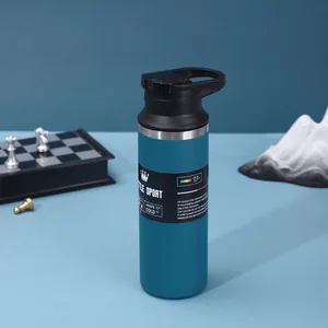 Detail of blue 304 stainless steel insulated sport water bottle with handle lid