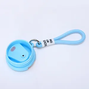 Close-up detail showing the light blue vacuum flask lid with durable woven carrying strap
