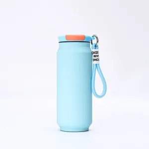 Blue can-shaped insulated bottle detail with braided carry strap and flip-top lid.