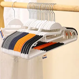Non-marking plastic hangers with non-slip rubber grips on a wooden rod