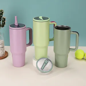 Group of 40oz insulated stainless steel tumblers with handles and straws