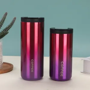 Duo of red to purple gradient stainless steel vacuum coffee tumblers in two sizes.