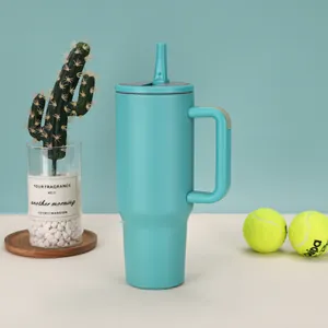 Modern cyan 40oz stainless steel insulated tumbler with straw and ergonomic handle