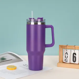 Detailed macro view of a purple 40oz insulated stainless steel tumbler with handle and straw