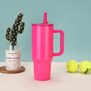 Detail view of hot pink 40oz insulated stainless steel tumbler with handle and straw.