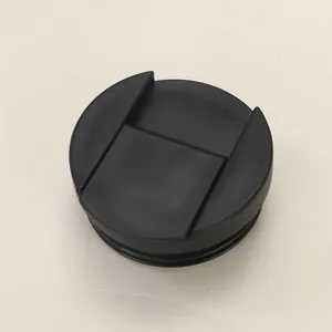 Detail shot of a black spill-proof lid for vacuum insulated travel coffee cups
