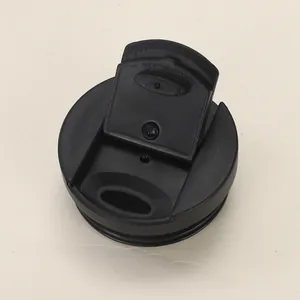 Detailed macro view showing the functional black plastic direct-drinking coffee cup lid
