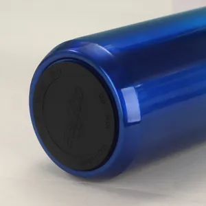 Detail of the non-slip base on a blue stainless steel vacuum insulated coffee mug
