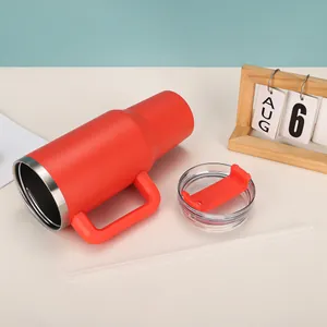Detailed macro view of red 40oz vacuum insulated tumbler with lid, handle and straw
