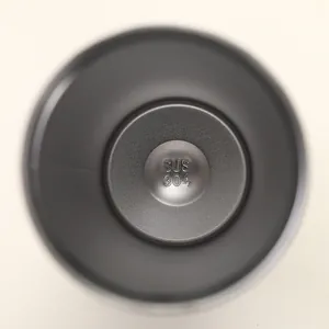 Close-up of SUS 304 food-grade stainless steel interior of a vacuum coffee cup