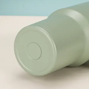 Detail shot of the sage green insulated tumbler base showing the bottom construction.
